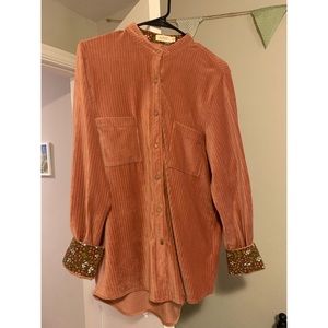 Roolee blouse. Velvet material, really soft. Brown cuffs with flowers.